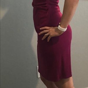 Pink/purple colored dress.